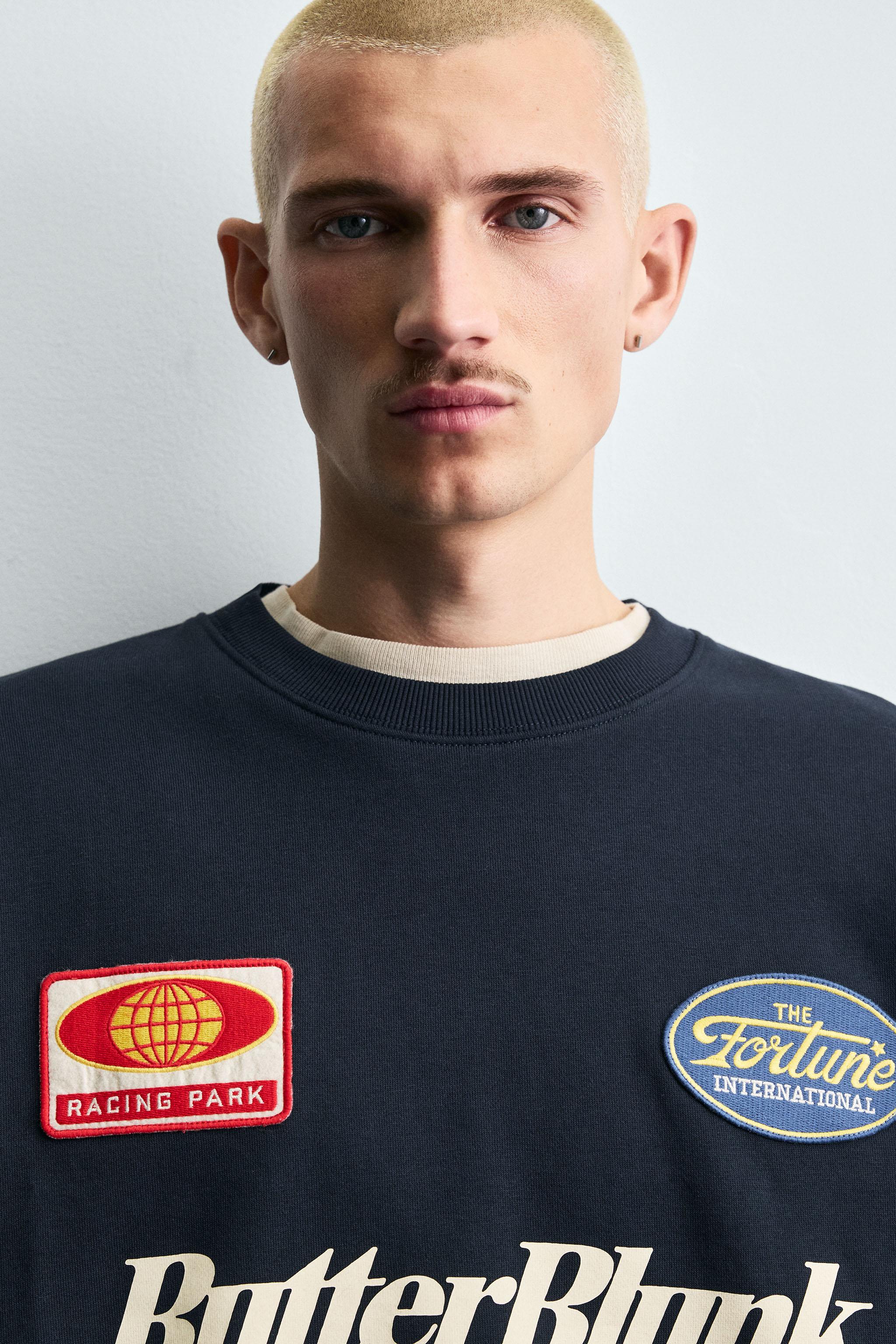 SWEAT COL ROND AVEC PIÈCES